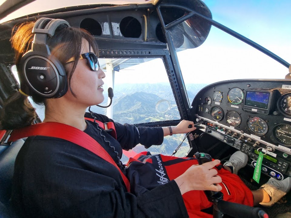 Dajung KIM flying an aircraft