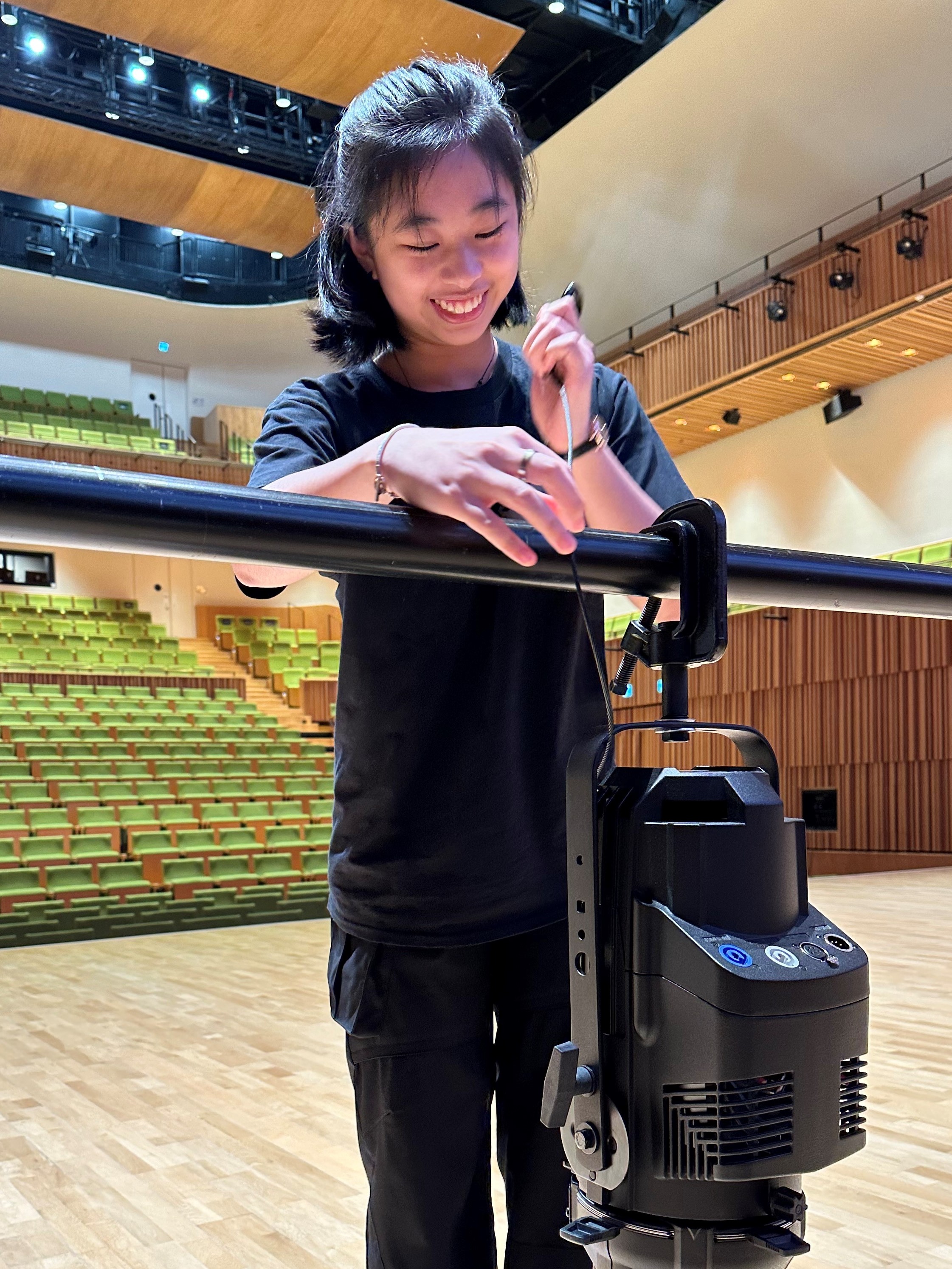 HKUST student rigging the light on stage