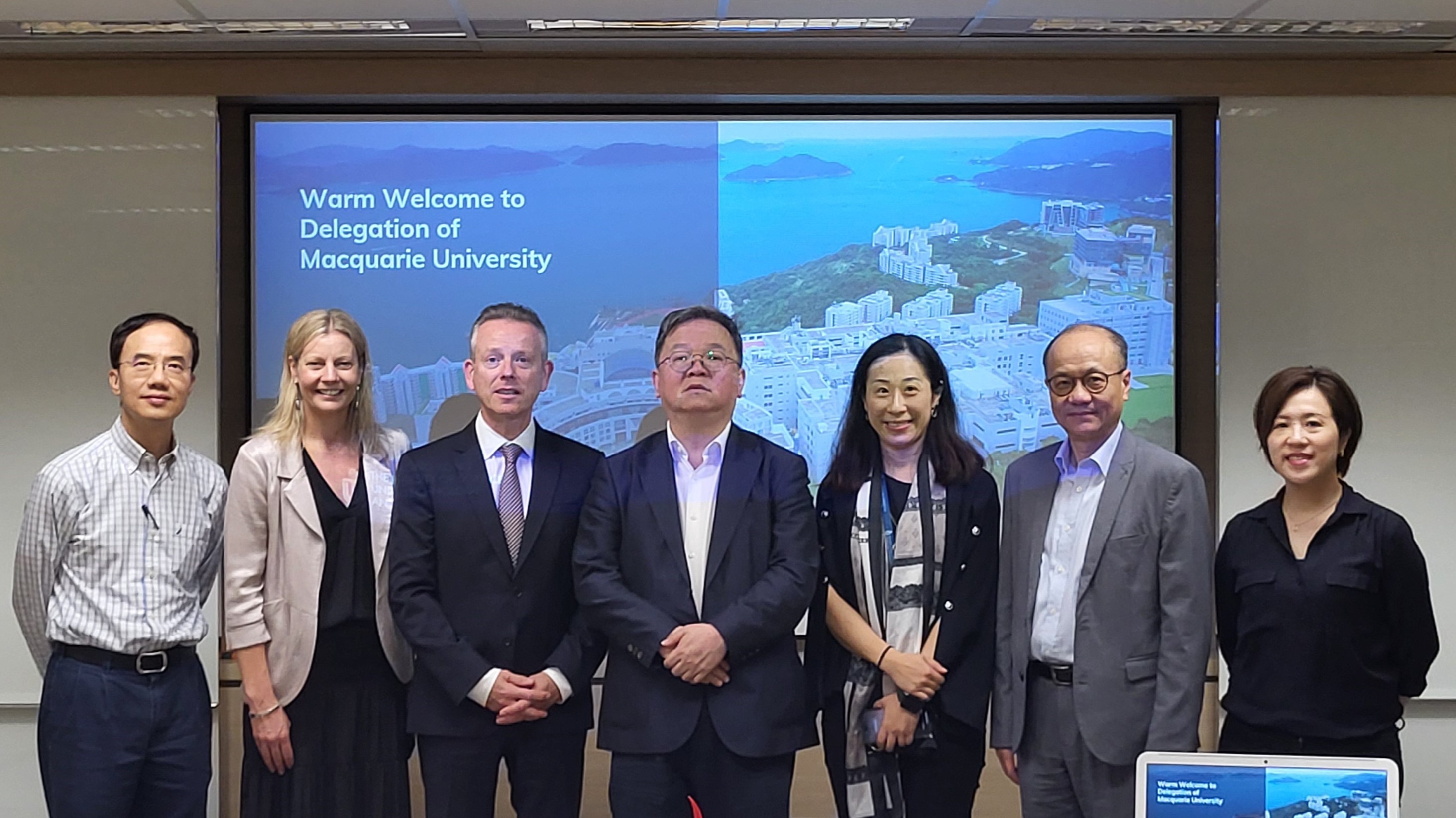 A group photo of Macquarie University  delegation Deputy Vice-Chancellor of Academic Prof. Rorden WILKINSON (third left) and Pro Vice-Chancellor of Education Prof. Taryn JONES (second left) with HKUST Provost Prof. GUO Yike (center); Associate Provost for Teaching & Learning Prof. Jimmy FUNG(first left); Assistant Dean (Administration) & MSc Program Director, School of Business & Management Mr. Chris TSANG (second right), Head of Global Learning Ms. Euphemia CHOW (first right) and Head of Global Engagement 