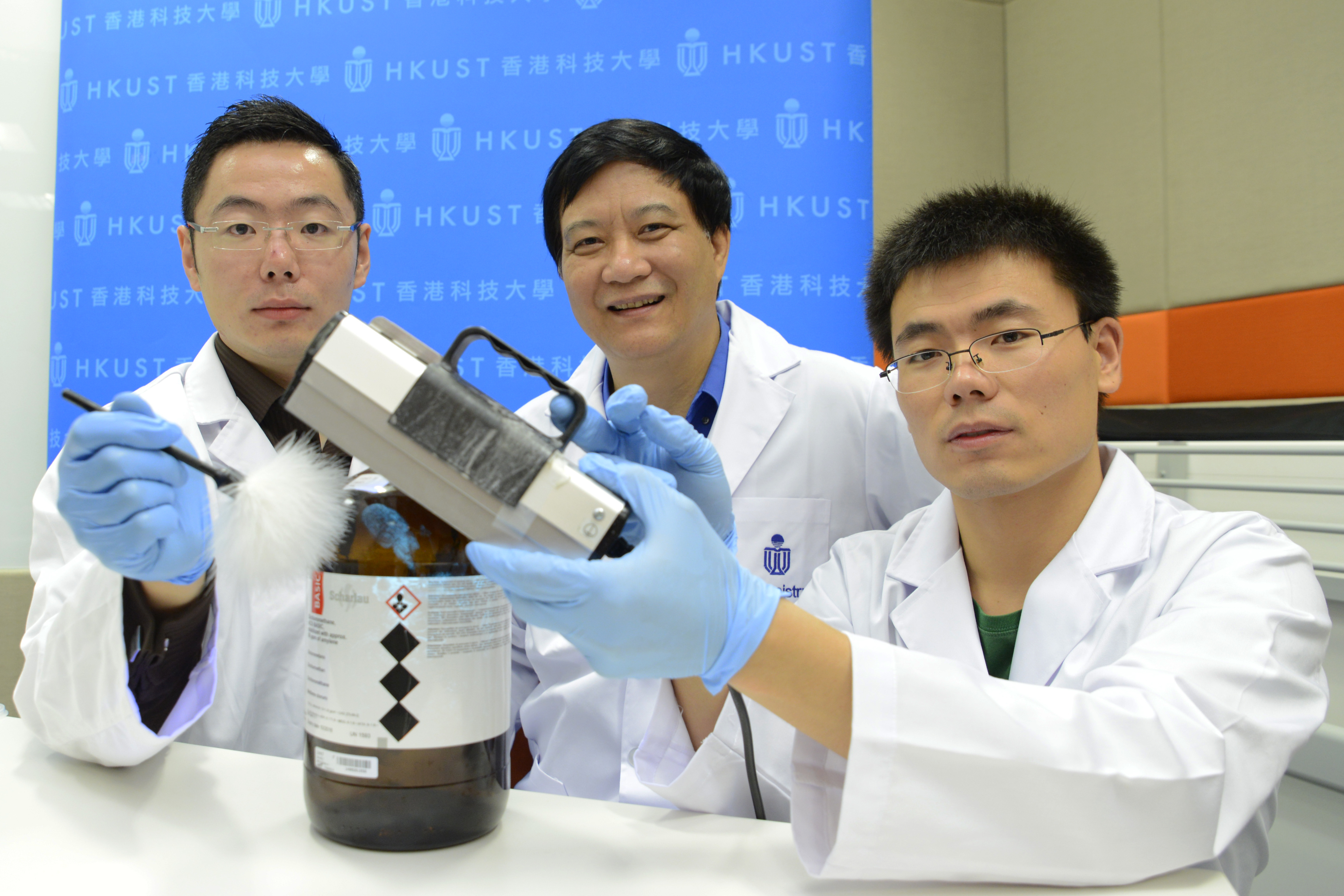  Dr Leo Ni Xie (First right), Prof Benzhong Tang (middle) and Mr Engui Zhao.