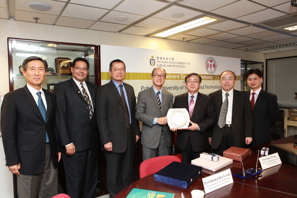  At the signing ceremony: (from left) HKUST Associate Dean of Engineering Prof Jang Kyo Kim; HKUST Dean of Engineering Prof Khaled Ben Letaief; HKUST Vice-President for Institutional Advancement Dr Eden Woon; HKUST President Tony F Chan; POSTECH President Sunggi Baik; POSTECH Dean of Academic Affairs Prof Jin Soo Lee; and HKUST Associate Dean of Engineering Prof Charles Ng.