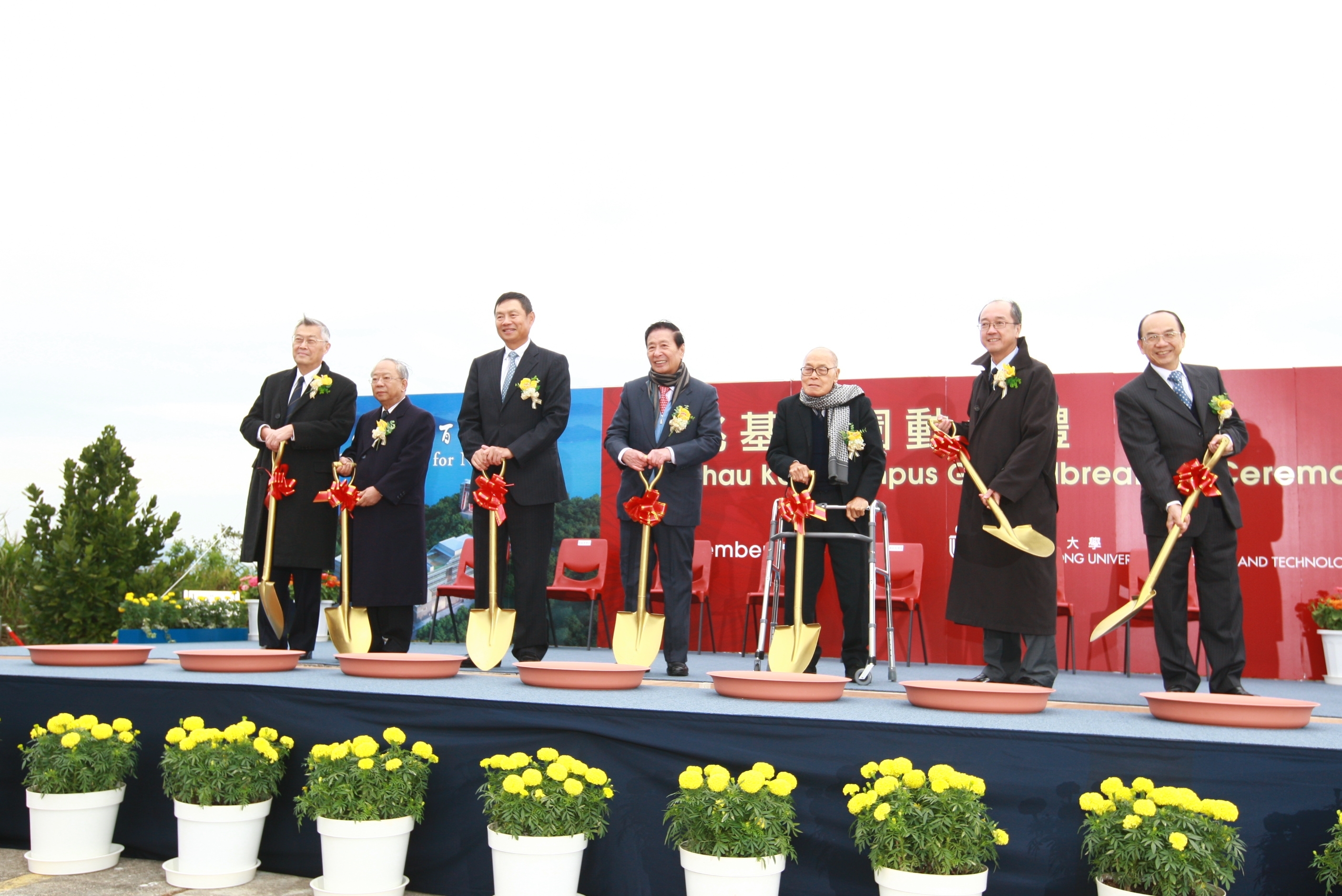 Officiating at the Ground Breaking Ceremony are (from left) President Emeritus Prof Chia-Wei Woo, Court Chairman Dr John CC Chan, Council Chairman Dr Marvin KT Cheung , Dr Lee Shau Kee, Pro-Chancellor Dr SY Chung, President Tony F Chan, and Council Vice-Chairman Dr Michael HH Mak.	