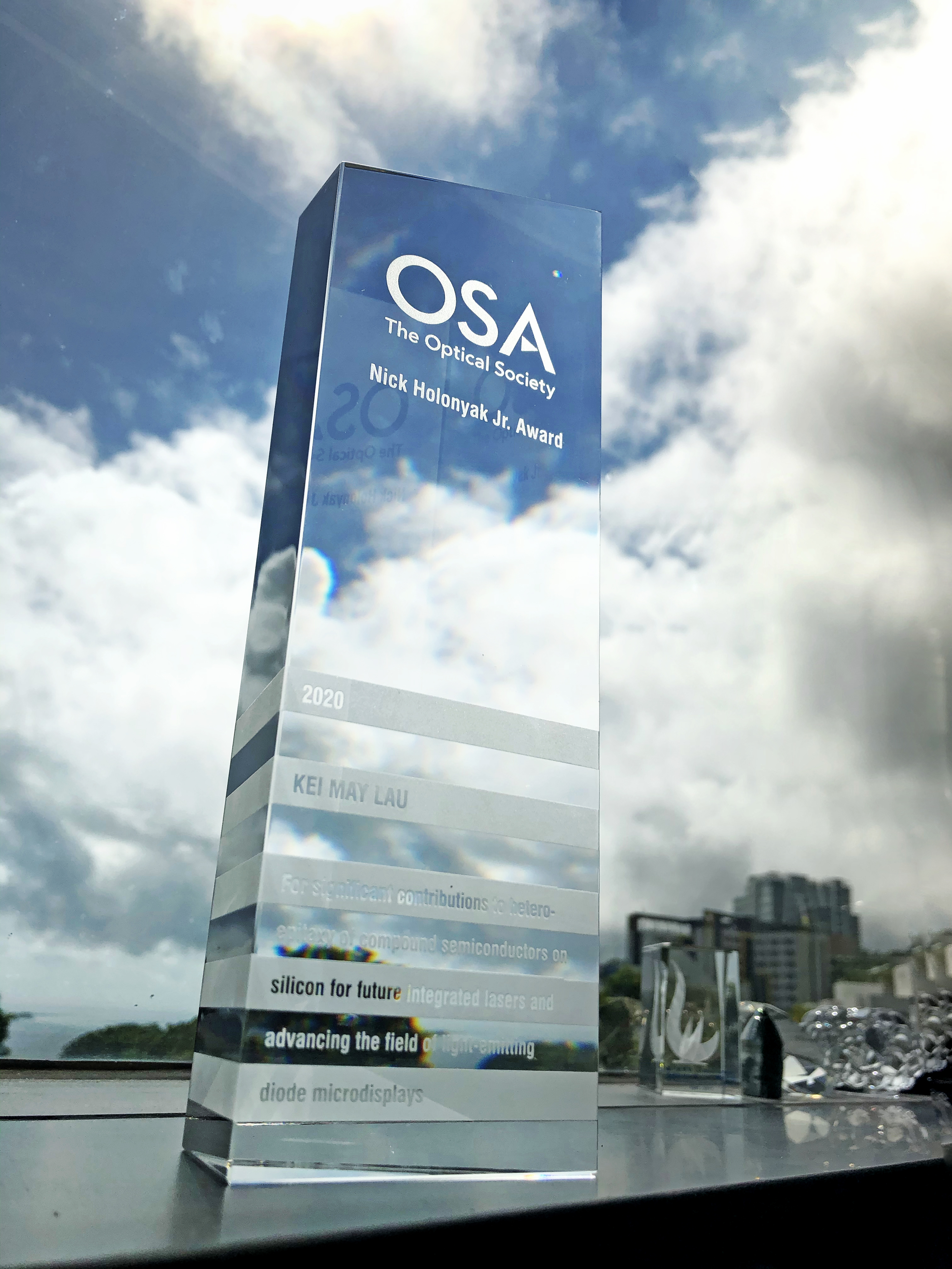 The Nick Holonyak Jr. Award recognizes significant contributions to optics based on semiconductor-based optical devices and materials, including basic science and technological applications.