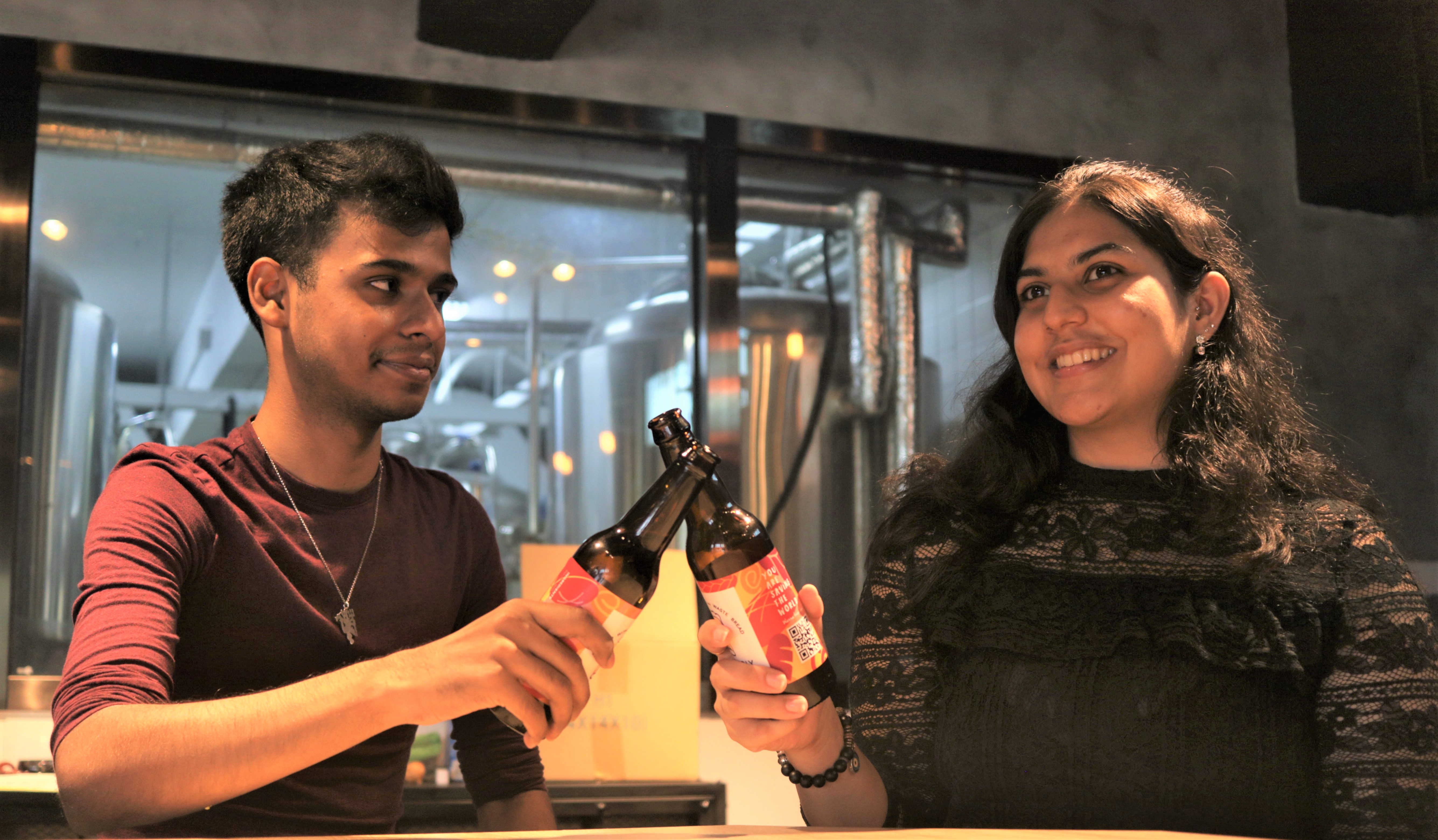 students holding beers