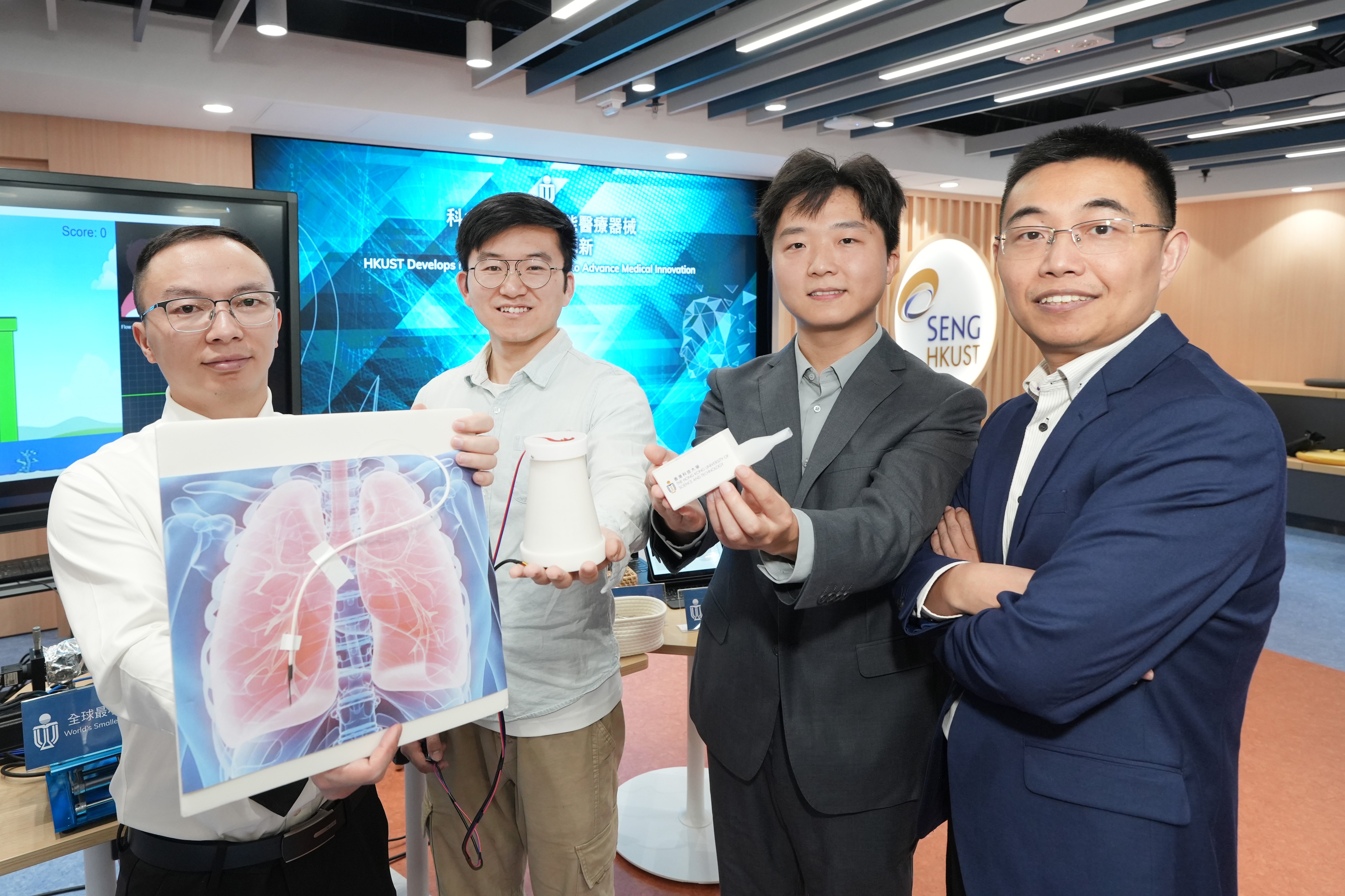 Prof. SHEN Yajing (right) led his research team to develop innovative smart medical devices that leverage the power of AI and robotics technology.