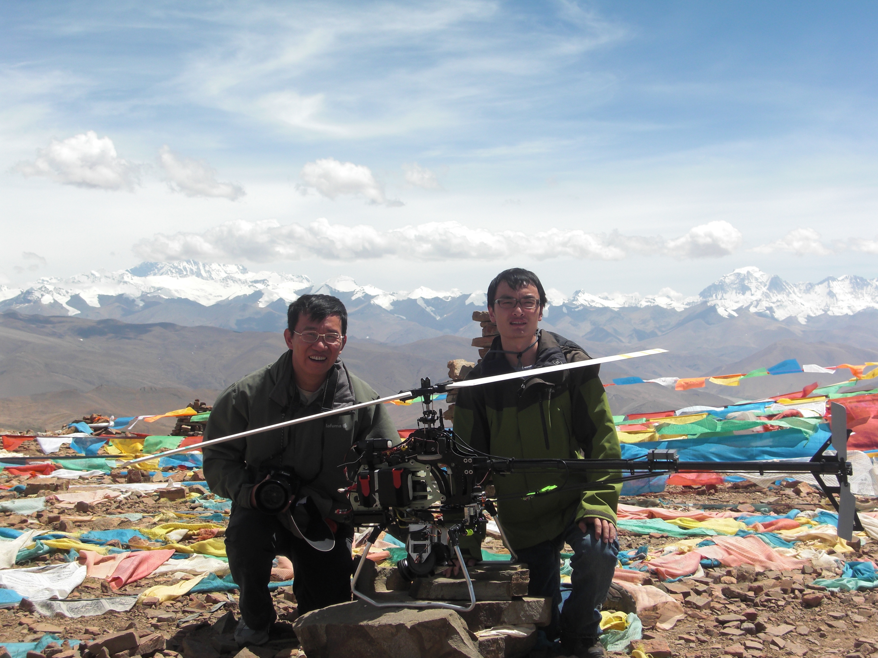 Prof Zexiang Li (left) and Frank Wang in Tibet before launching the helicopter test flight