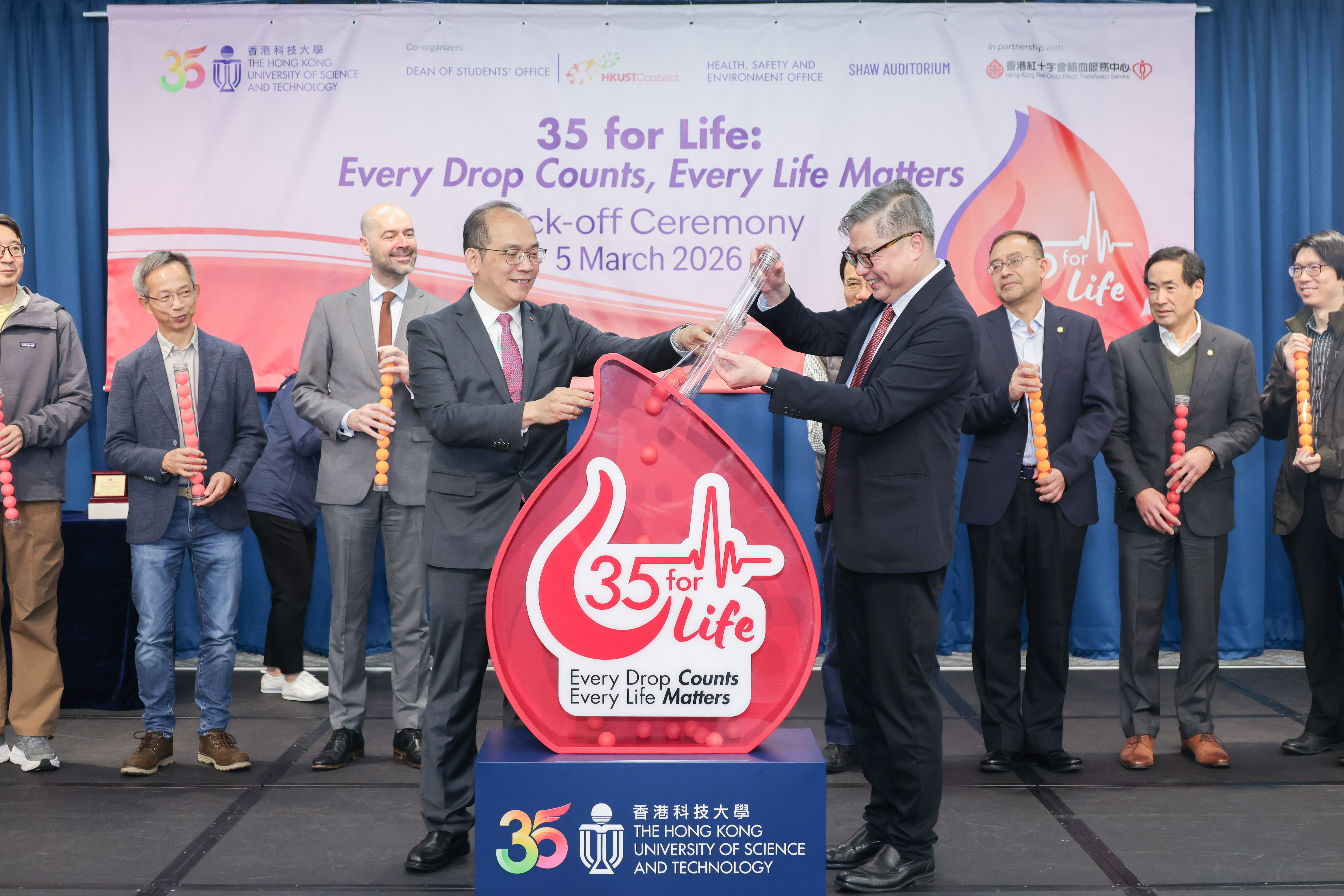 The blood donation drive was launched by Prof. Tam Kar Yan, Vice-President for Administration and Business (right), and Dr. Lee Cheuk Kwong (left), Chief Executive and Medical Director, Hong Kong Red Cross Blood Transfusion Service.