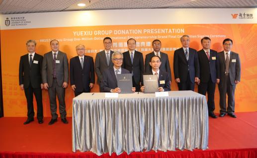HKUST President Prof. Wei SHYY (front left) and Yuexiu General Manager Mr. ZHU Chunxiu (front right) sign the HK$100 million donation agreement under the witness of officiating guests including Mr. Kevin YEUNG Yun-Hung, Secretary for Education, HKSAR (back row, fourth left); Mr. YANG Jian, Deputy Director of the Liaison Office at the Central People's Government in the HKSAR (back row, middle); Mr. YANG Yirui, Deputy Commissioner of the Ministry of Foreign Affairs of the People's Republic of China in th