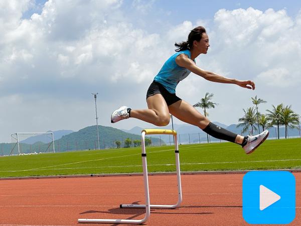 HKUST student-athlete jumping hurdles